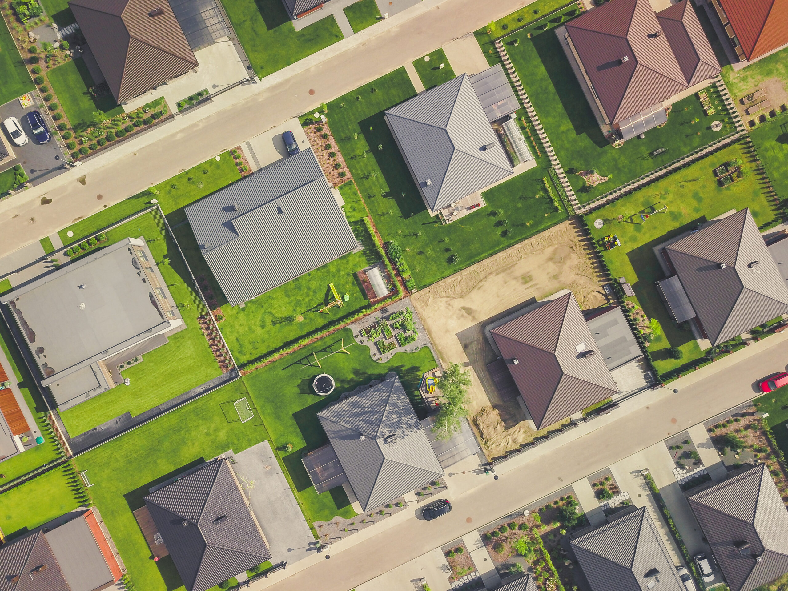 A neighborhood with houses and lawns