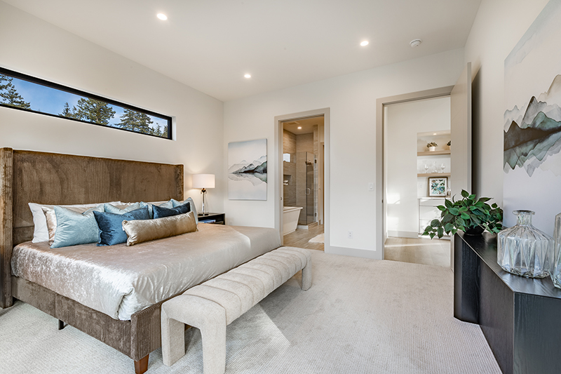 The Sussex - primary bedroom with ample light and ensuite